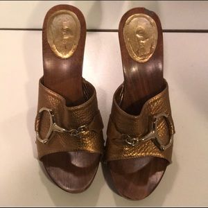 Gucci metallic gold sandals.